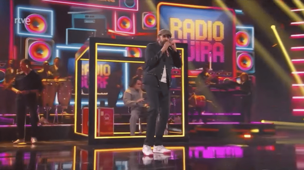 Juan Luis Guerra does a rendition of one of his hit songs from his album Radio Güira